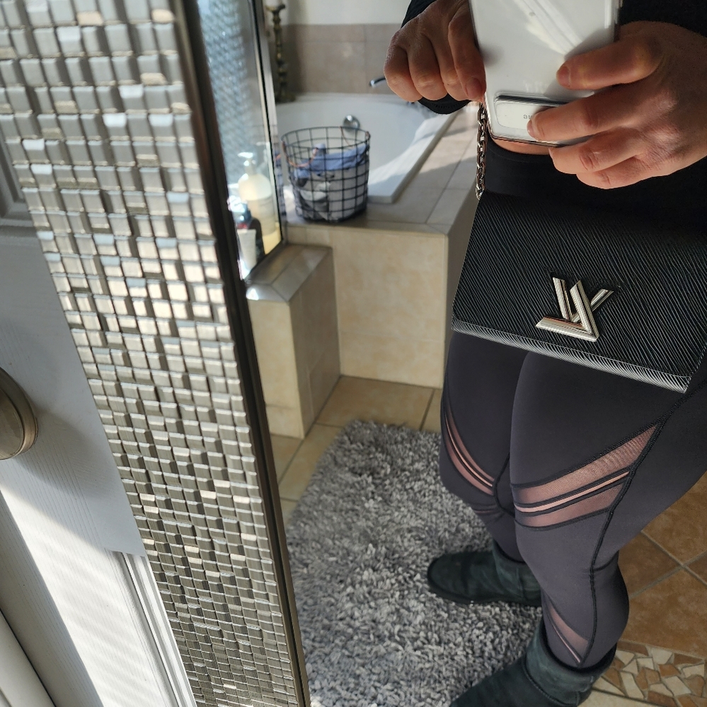 Authentic Purse it is smaller size very pretty almost new I worn couple time